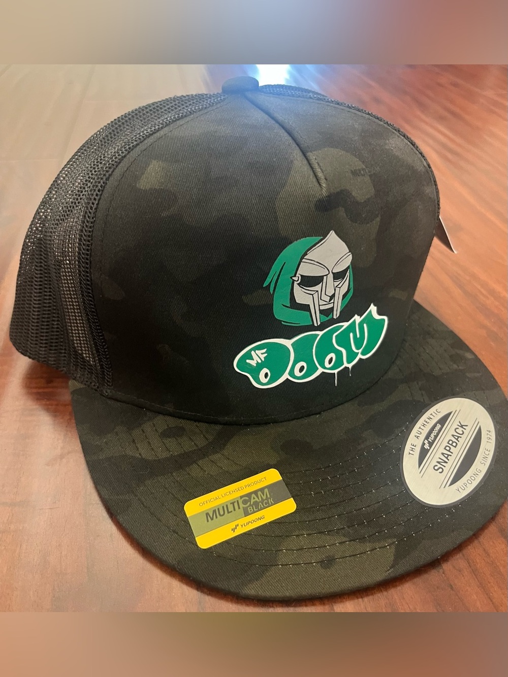 MF DOOM Camouflage Trucker Hat in Black and Green Snapback